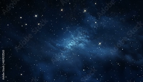 A starry night sky with wispy clouds