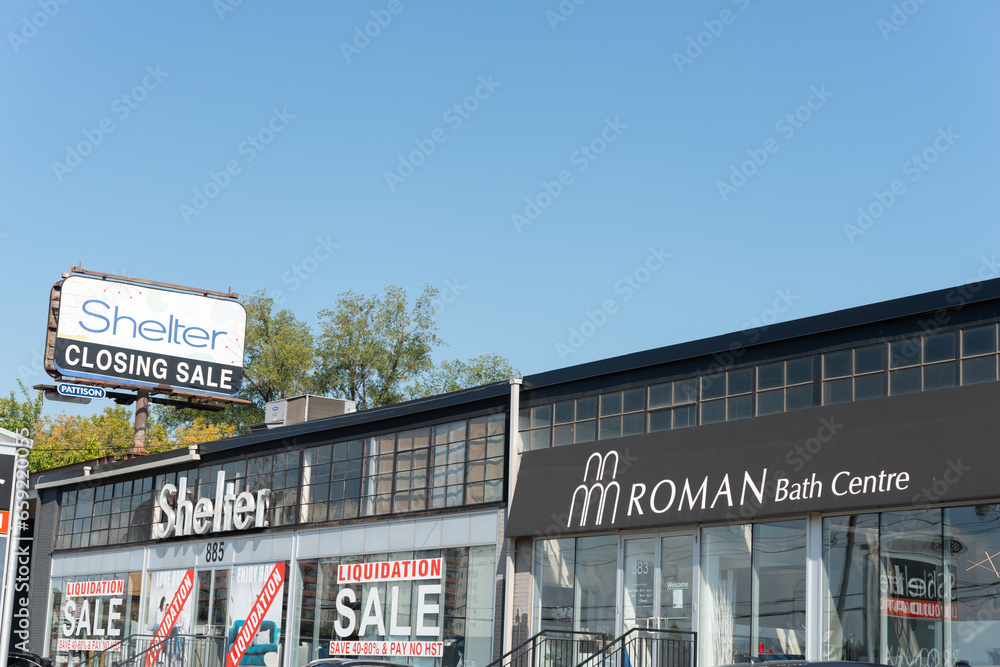 exterior building, facade, and signages of (left) Shelter Furniture and