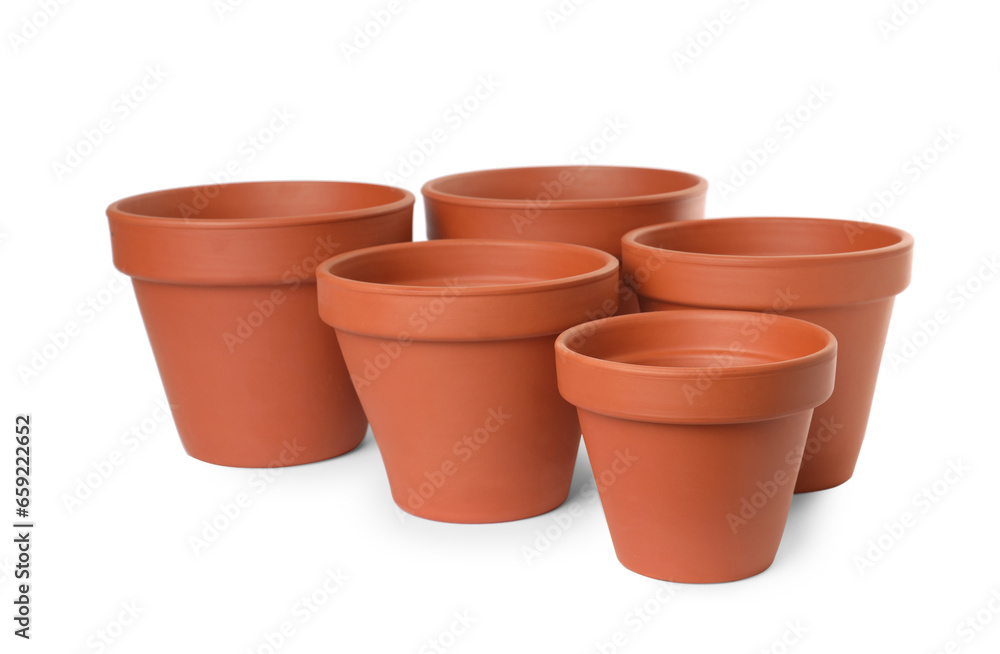 Empty clay flower pots isolated on white Empty clay flower pots isolated on white