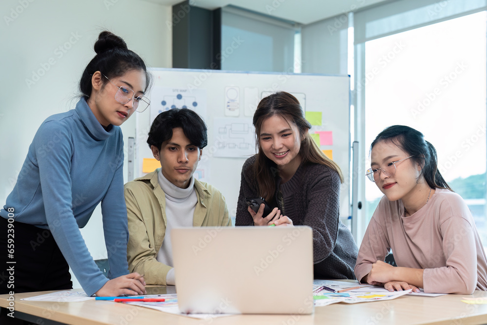 Team of ux developer and ui designer brainstorming interface wireframe design. Creative digital development agency Team of ux developer and ui designer brainstorming interface wireframe design. Creative digital development agency
