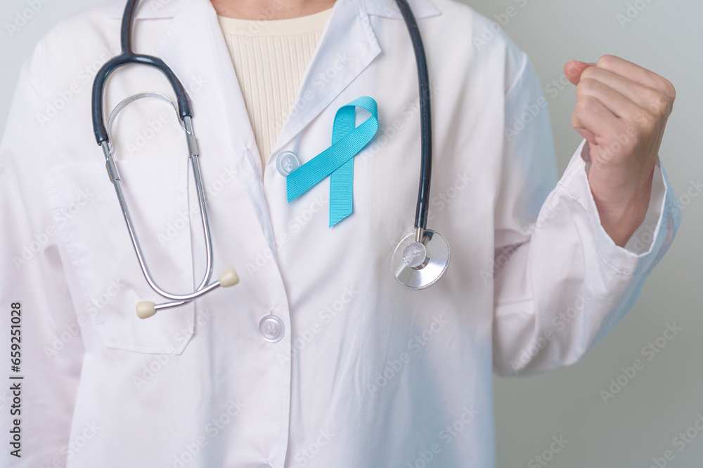 Blue November Prostate Cancer Awareness month, Doctor with Blue Ribbon in hospital for support people life and illness. Healthcare, International men, Father, Diabetes and World cancer day Blue November Prostate Cancer Awareness month, Doctor with Blue Ribbon in hospital for support people life and illness. Healthcare, International men, Father, Diabetes and World cancer day