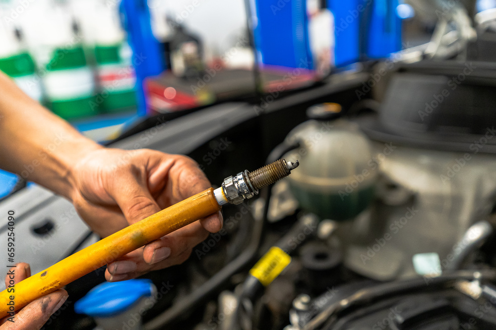Close up view of a Maintenance Car service - auto oil change, motor check, brake cleaning, tire check, engine inspection, motor oil-brake inspection
