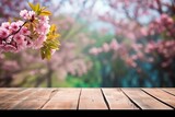old wood floor with pink Sakura flowers blooming blossom blurred background. generative ai.