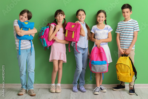 Little pupils with backpack...