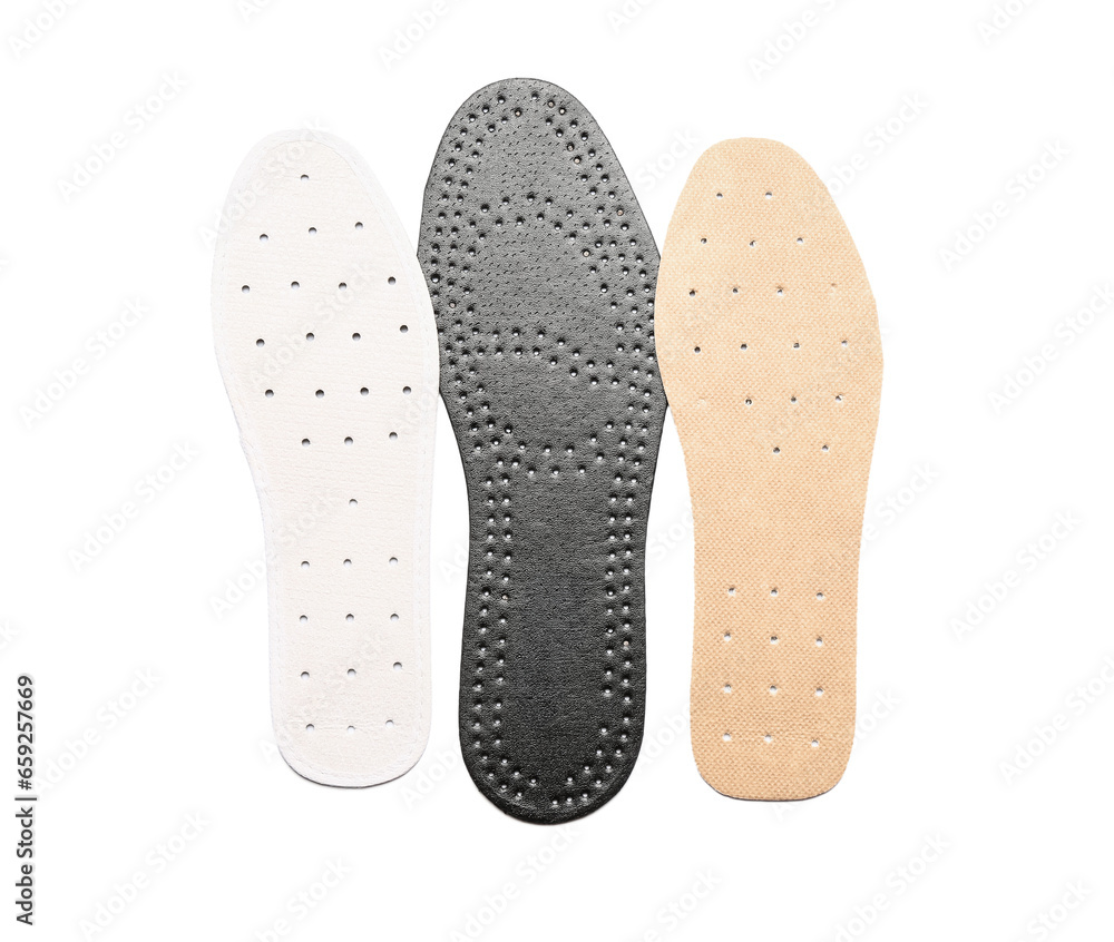 Different orthopedic insoles isolated on white background Different orthopedic insoles isolated on white background