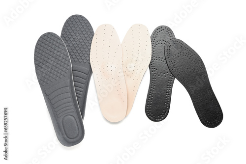 Set of different orthopedic insoles isolated on white background