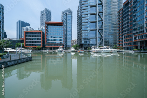 Canvas Print financial district buildings of shanghai  in sunny day and the yacht docked at t