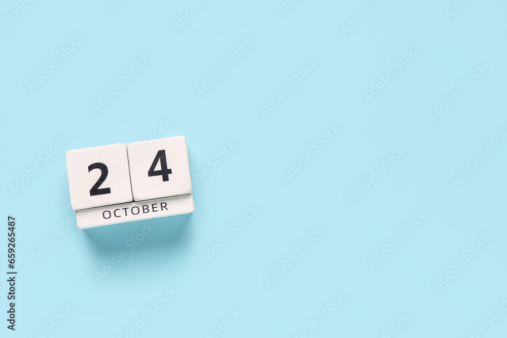 Cube calendar with date 24 OCTOBER on blue background. World Polio Day Cube calendar with date 24 OCTOBER on blue background. World Polio Day