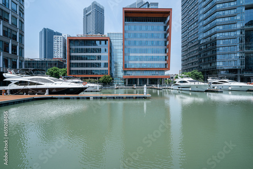 Canvas Print financial district buildings of shanghai  in sunny day and the yacht docked at t