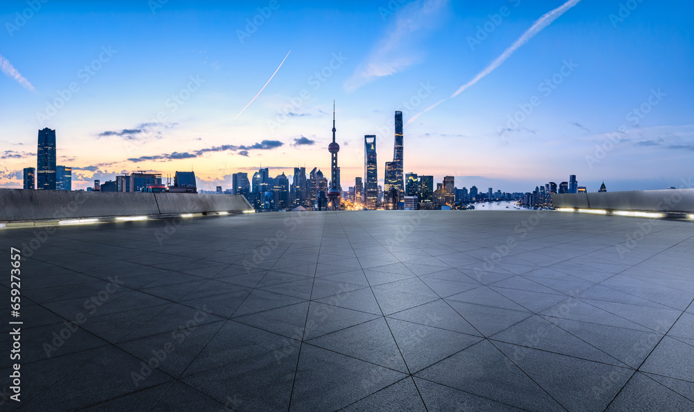 Shanghai city skyline and square floor in the early morning