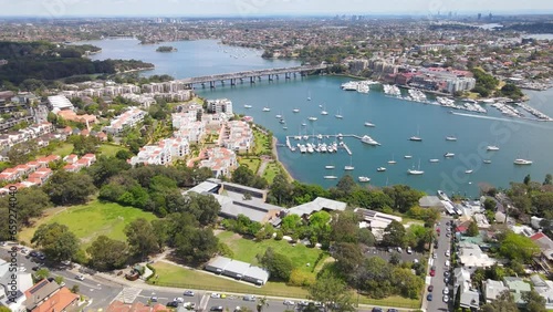 Aerial drone view over Balmain in Sydney, New South Wales, Australia looking toward Sommerville Point and Birkenhead Point on a sunny day     photo