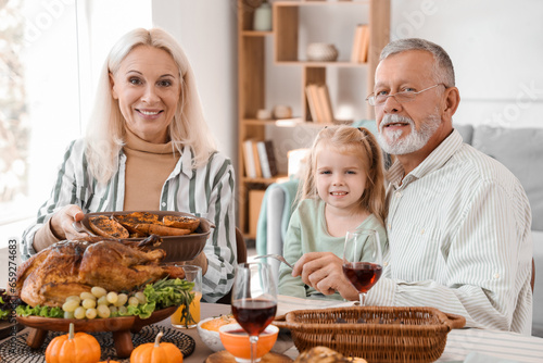 Little girl with her grandp...