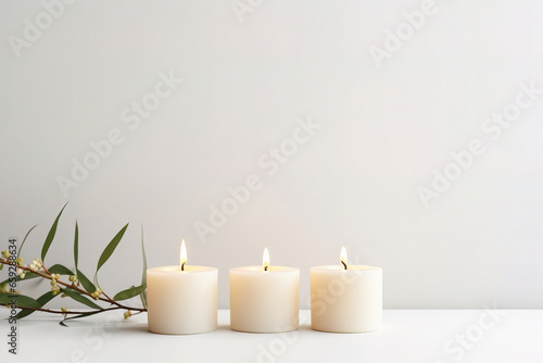minimalistic candles on a light background  with empty copy space