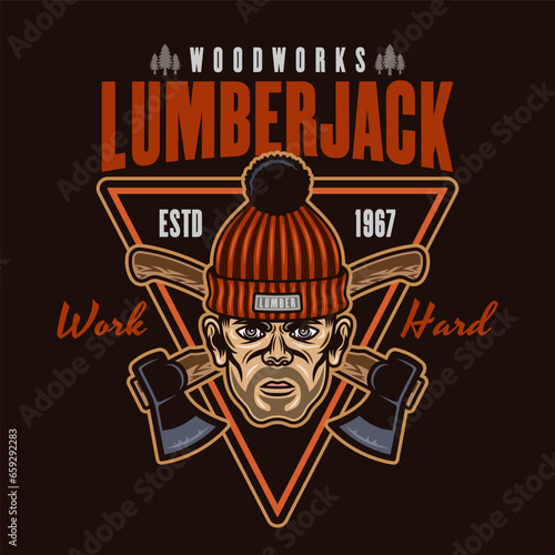 Lumberjack head in knitted hat and crossed axes vector emblem in colored style on dark background