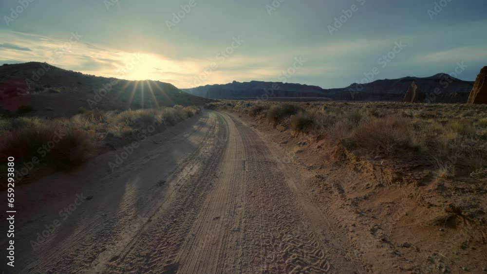 Desert Road With Sun Flare - Wide, dolly forward shot Desert Road With Sun Flare - Wide, dolly forward shot