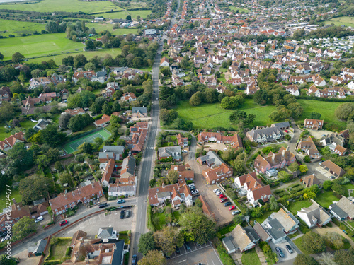 Drone high altitude view of a typical British town. Showing the main through road and residential houses. photo