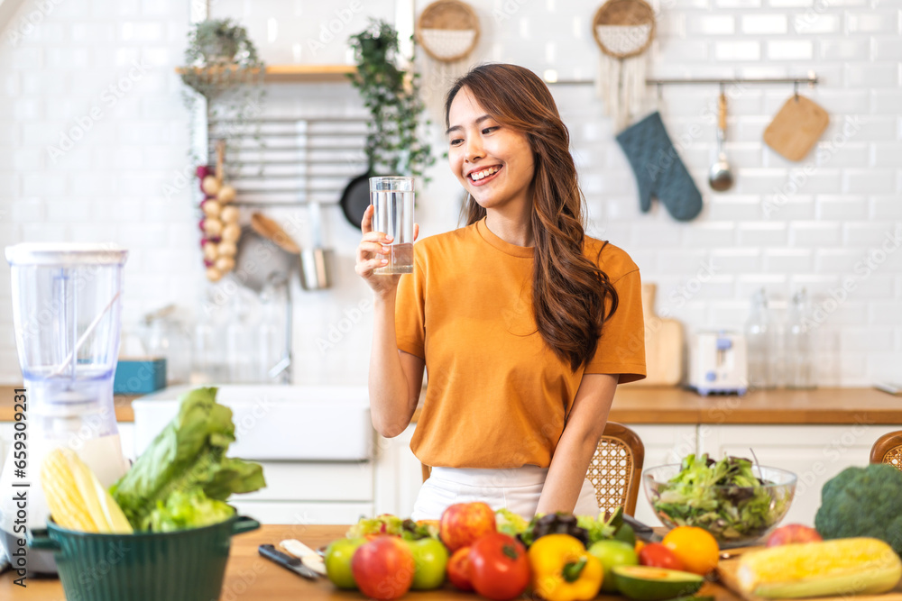 Portrait asian beauty body slim woman drinking water from a bottle while relax and feeling fresh, refresh drink, wellness, diet, healthcare, mineral at home.Healthy liquid lifestyle concept Portrait asian beauty body slim woman drinking water from a bottle while relax and feeling fresh, refresh drink, wellness, diet, healthcare, mineral at home.Healthy liquid lifestyle concept