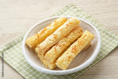 Cheese Stick Pastry served on white bowl 