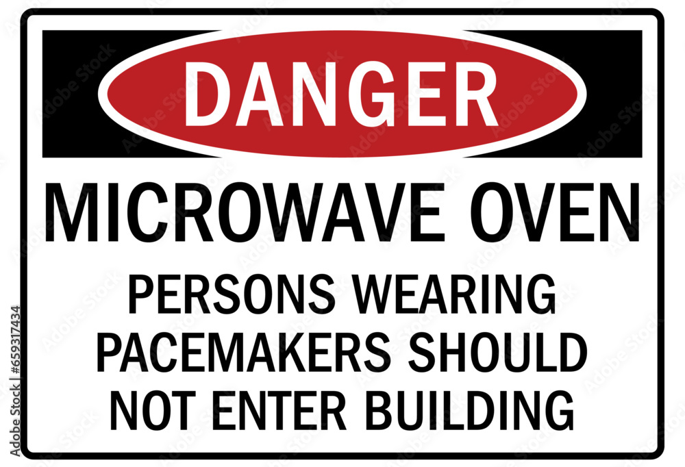 Fototapeta premium Pacemaker and magnetic hazard warning sign and labels microwave oven. Persons wearing pacemakers should not enter building