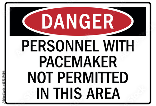 Pacemaker and magnetic hazard warning sign and labels personnel with pacemaker not permitted in this area