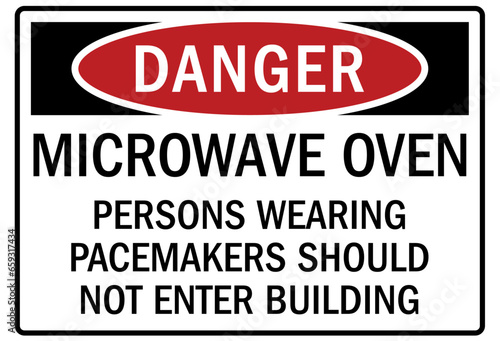 Pacemaker and magnetic hazard warning sign and labels microwave oven. Persons wearing pacemakers should not enter building