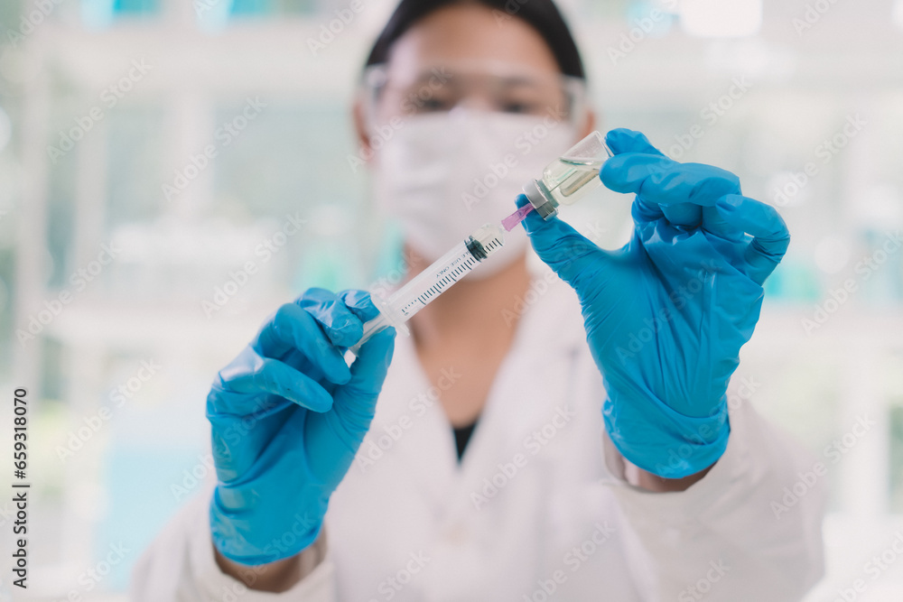 Nutrition experts test vegetables. and solution in the laboratory Nutrition experts test vegetables. and solution in the laboratory