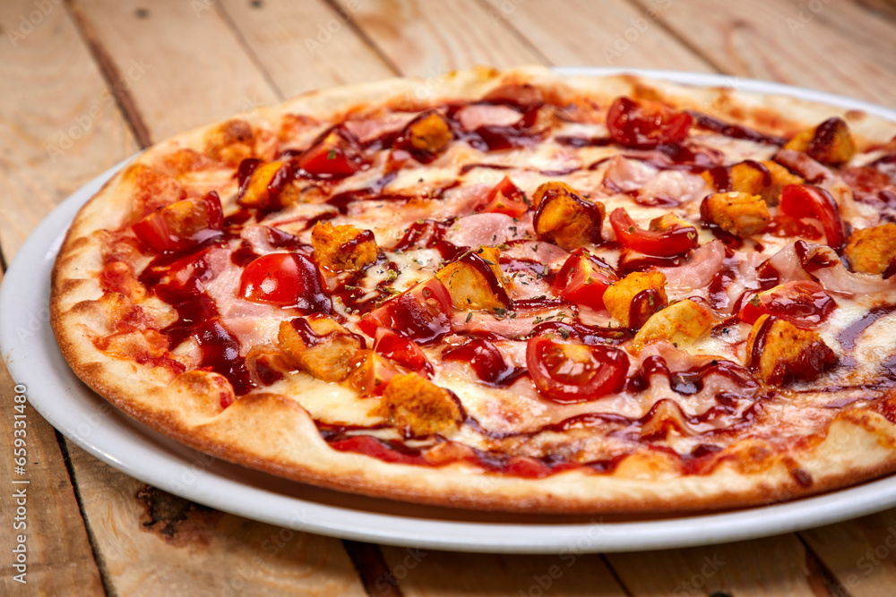 tasty pizza on the wooden background