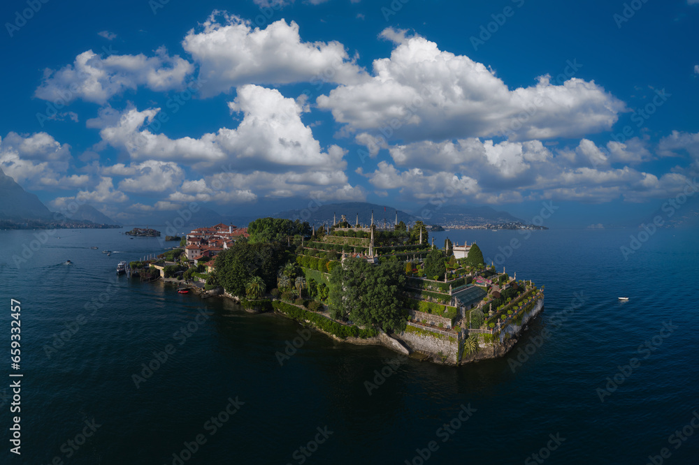 Aerial view of Isola Bella drone panoramic view. Lake Maggiore, island, Isola Bella, Italy. Panorama at sunset on Lake Maggiore top view. Borromean Islands, Lake Maggiore, Piedmont, Europe.