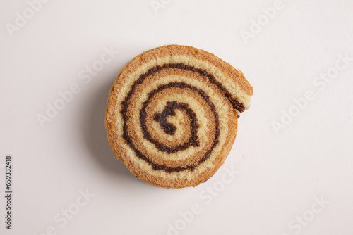brioche swirl with chocolate on a white background shot from above