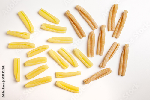 pasta of various kinds on a white background, top view