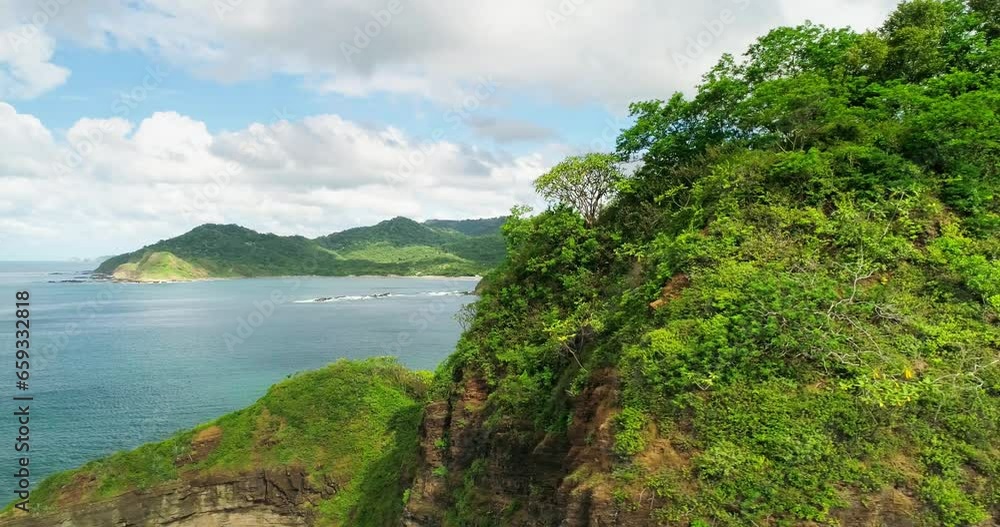 Sideways drone establisher, picturesque panorama coastline Nicaragua, sunny day