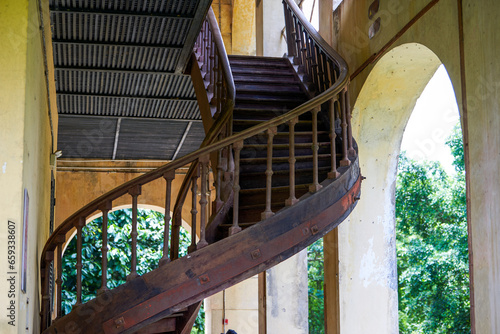 Wooden staircase of the French Consulate in Longzhou, Guangxi, China photo