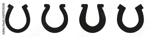 Horseshoe icons set. Black silhouettes of horseshoes on white background.