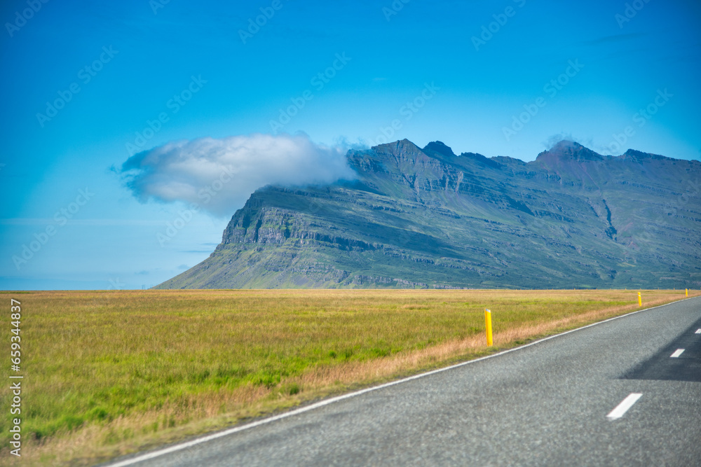 Naklejka premium Driving along the beautiful roads of Iceland in summer season