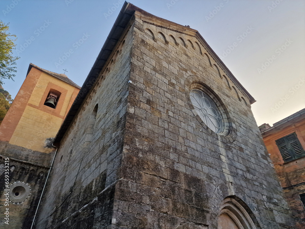 medieval church of San Nicolò Capodimonte san rocco of camogli at sunset