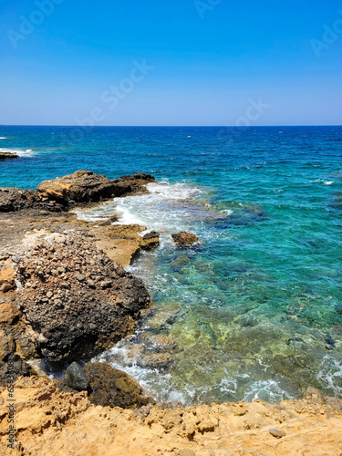 Dangerous and beautiful rocky shore of the Mediterranean Sea © Екатерина Стеблевска