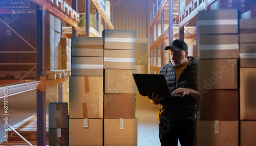 Man works in warehouse. Sto...