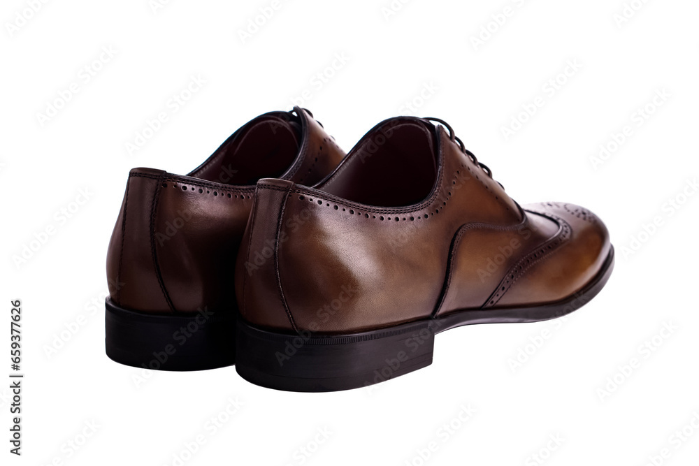 Brown leather men's shoes isolated on white background. Fashion classical polished men's brown oxford brogues. Brown leather men's shoes isolated on white background. Fashion classical polished men's brown oxford brogues.