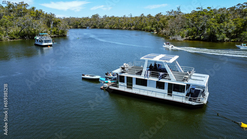 Houseboats and small boats on Blackwood River, Western Australia,