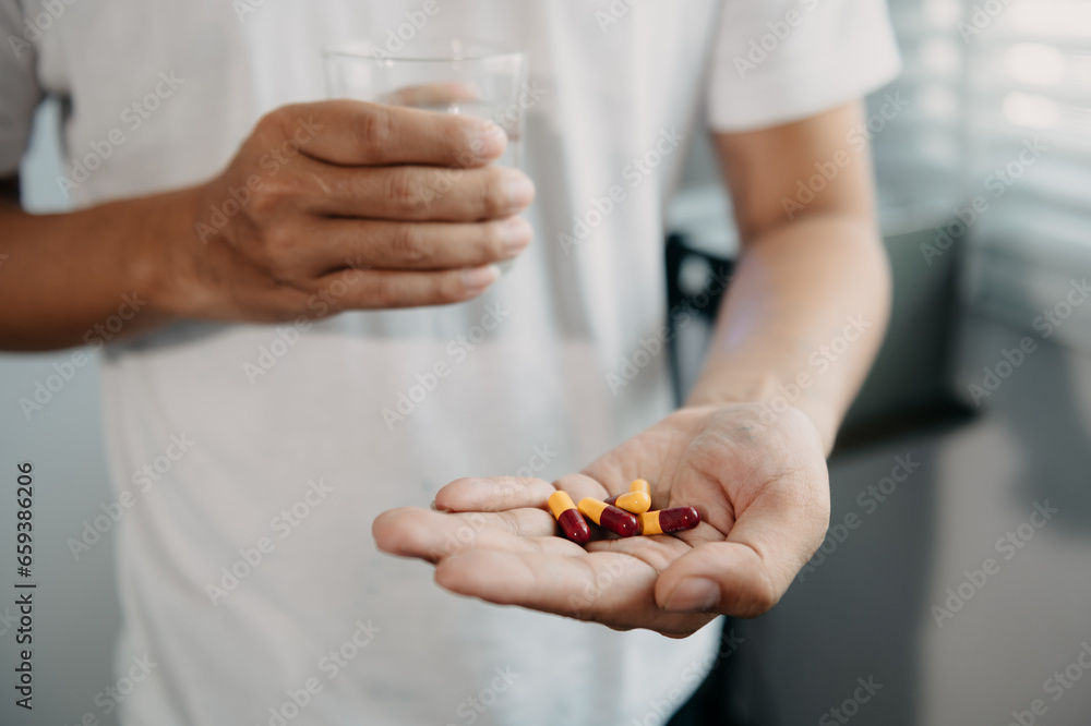 pills in a Senior's hands. Painful yound age. Caring for the health of the elderly pills in a Senior's hands. Painful yound age. Caring for the health of the elderly