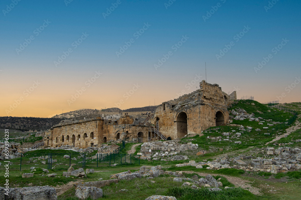 Ancient theaterAncient theater view. Ancient theater under sunset. view. Ancient theater under sunset. Pamukkale/Hierapolis