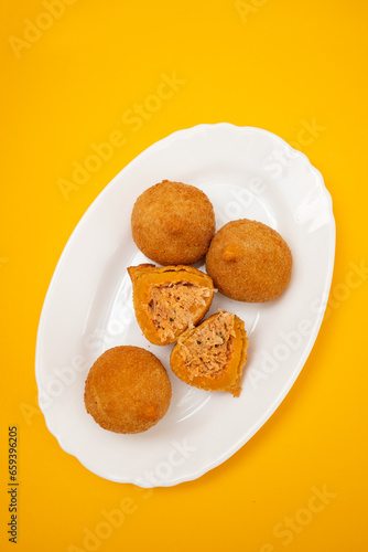 traditional fried coxinha on a plate