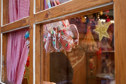 Candy cookies with wishes seen throw window in a German store