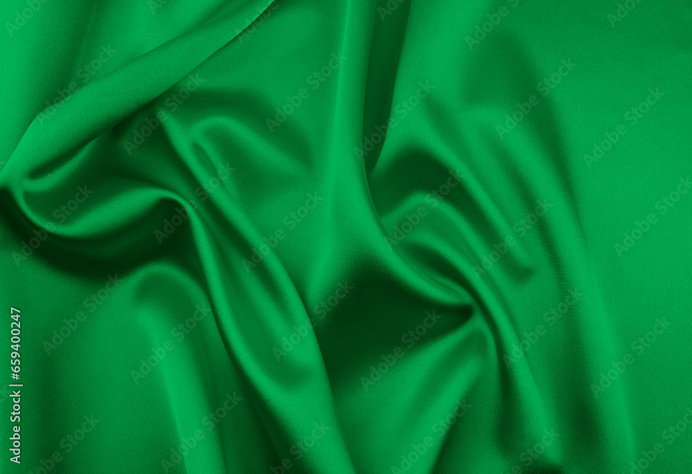 Green satin fabric as background Green satin fabric as background