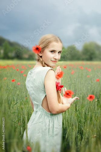 girl in poppy field