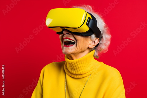 Senior woman having fun with virtual reality glasses. Old people using new headset goggles trends technology © Canvas Alchemy