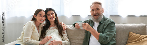 Εκτύπωση καμβά lgbt family and father of one of them drinking coffee smiling at camera, ivf con