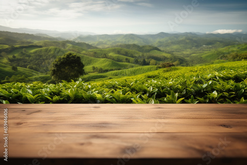 Top of surface wood table with blurred tea plantation background.