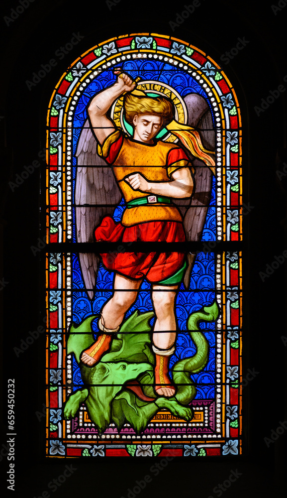 Saint Michael the Archangel. A stained-glass window in Church of St Alphonsus Liguori, Luxembourg City, Luxembourg. 2022/11/21.