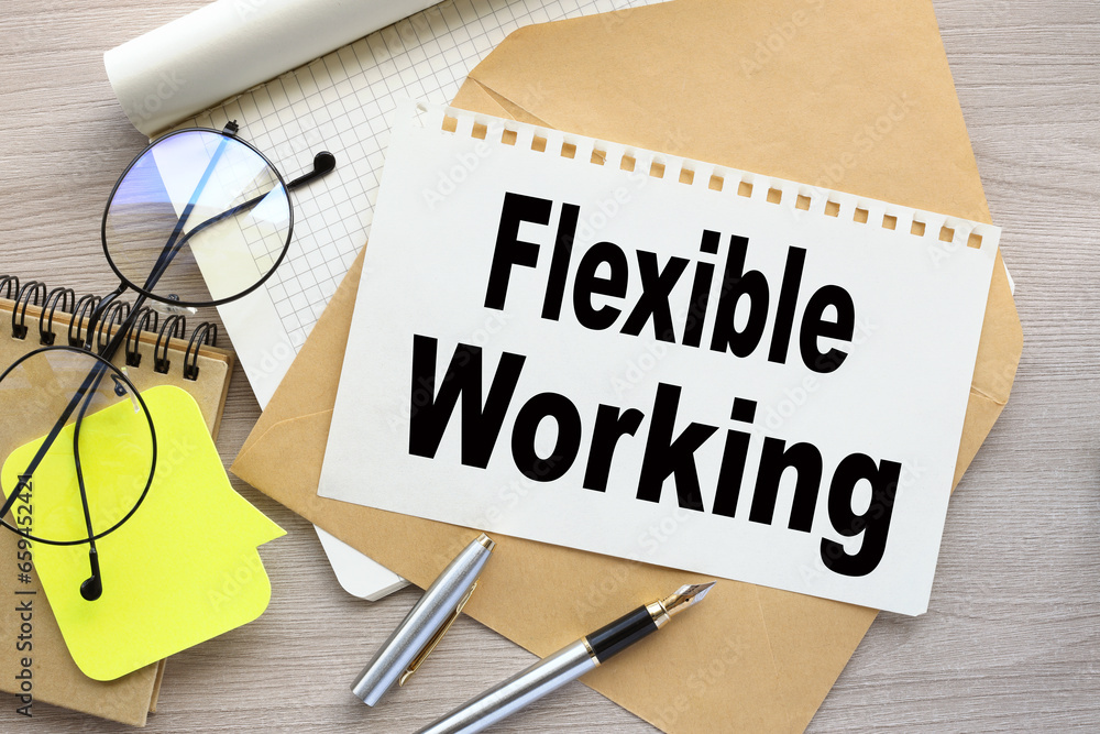 Flexible working work desk with text on page on envelope. Flexible working work desk with text on page on envelope.